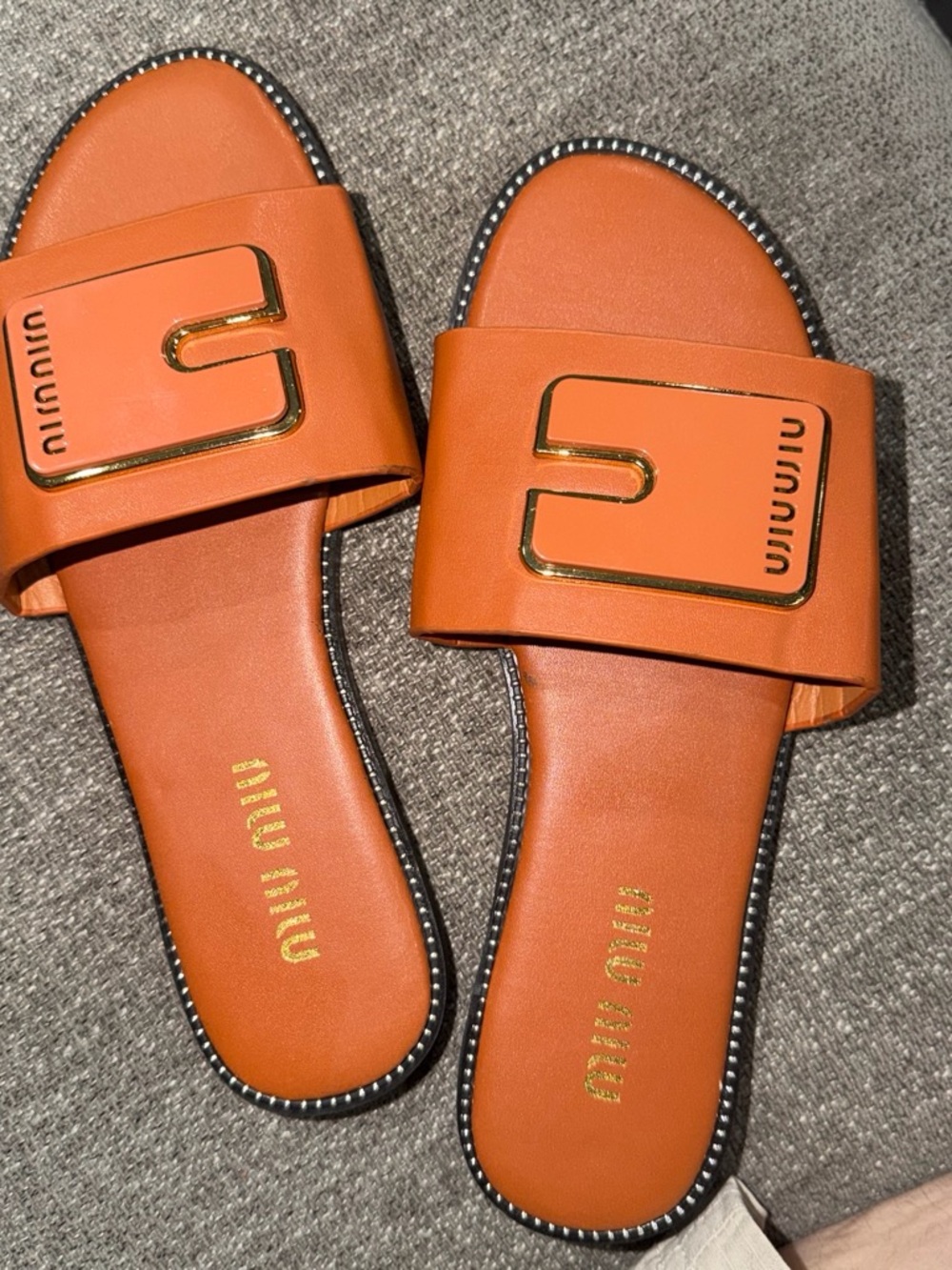 Miu Miu Orange Leather Slide Sandals with Gold Hardware